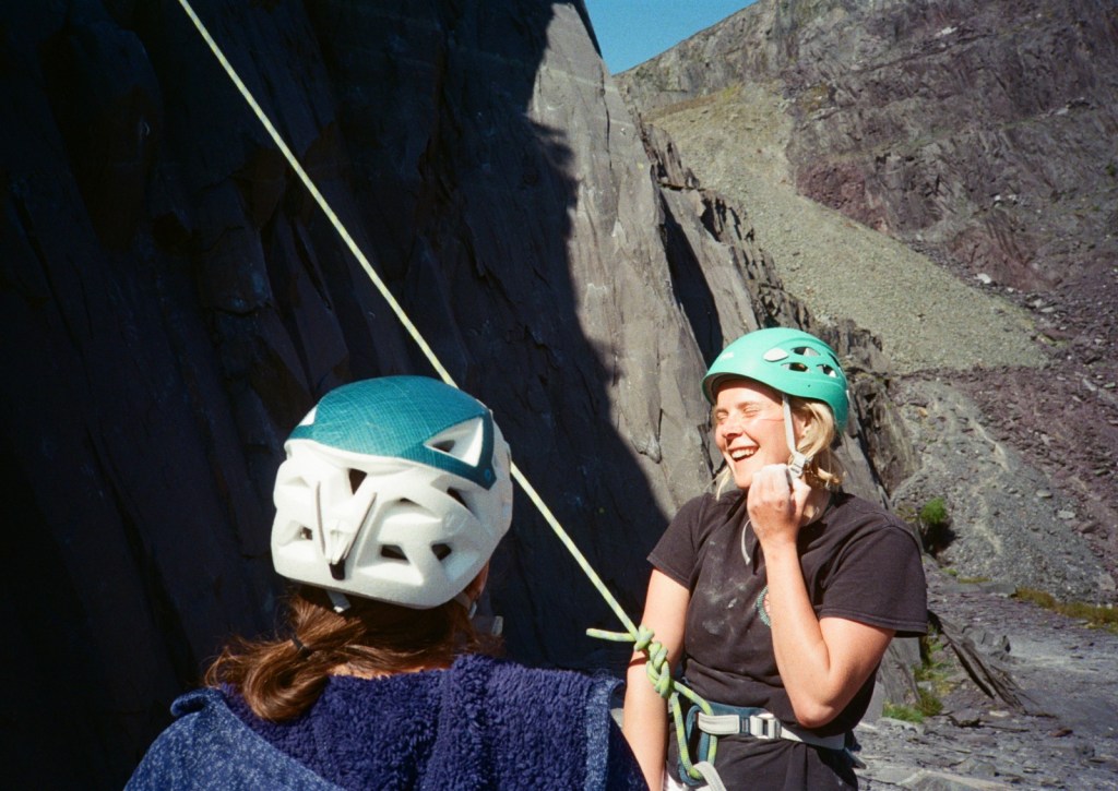 Tor and female client enjoying a day climbing outdoors